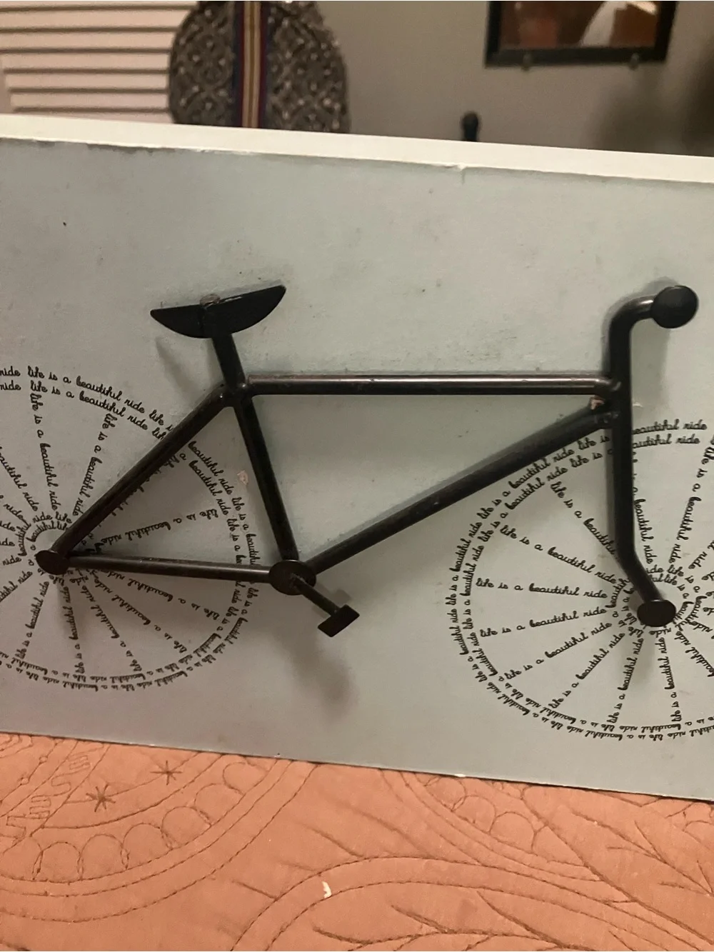 Black Metal Wall Art With a Minimalist Bicycle Silhouette